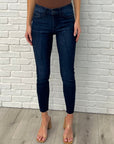 Fallon Mid Rise Adjustable Waist Raw Hem Skinny Jeans