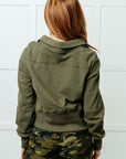 Under Her Spell Half Zip Pullover in Green