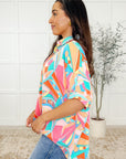 Wide Eyed Abstract Print Batwing Blouse