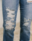 Maureen High Rise Distressed Bootcut Jeans
