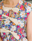 Mrs. Dependable Bow Detail Peplum Top