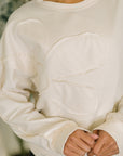 Petal Poise Floral Applique Pullover in Neutral