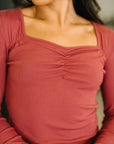 The Girls are Back in Town Long Sleeve Top in Burgundy